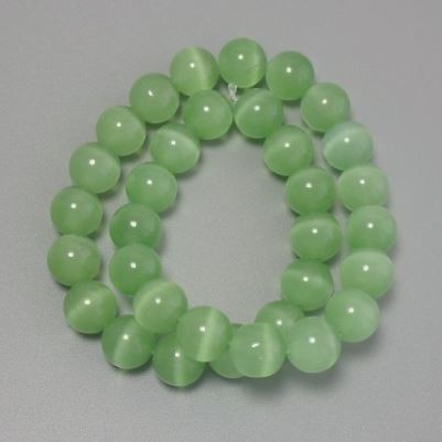 Koraliki Kocie oko w odcieniu sałatkowym, syntetyczny kamień, gładkie kuleczki, średnica 11,5 mm, na żyłce, długość 36 cm