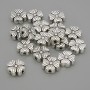 Koralik-wstawka 'Kwiat' kolor metalu: srebro, wymiary 9×9×3,5 mm, otwór 1,5 mm, opakowanie 20 g (~17 szt.)