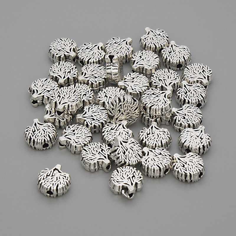 Drewniana wstawka-koralik w kolorze srebra, wymiary 8×7 mm i 5×3 mm, otwór Ø ok. 1,5 mm, opakowanie 20 g (~33 szt.)