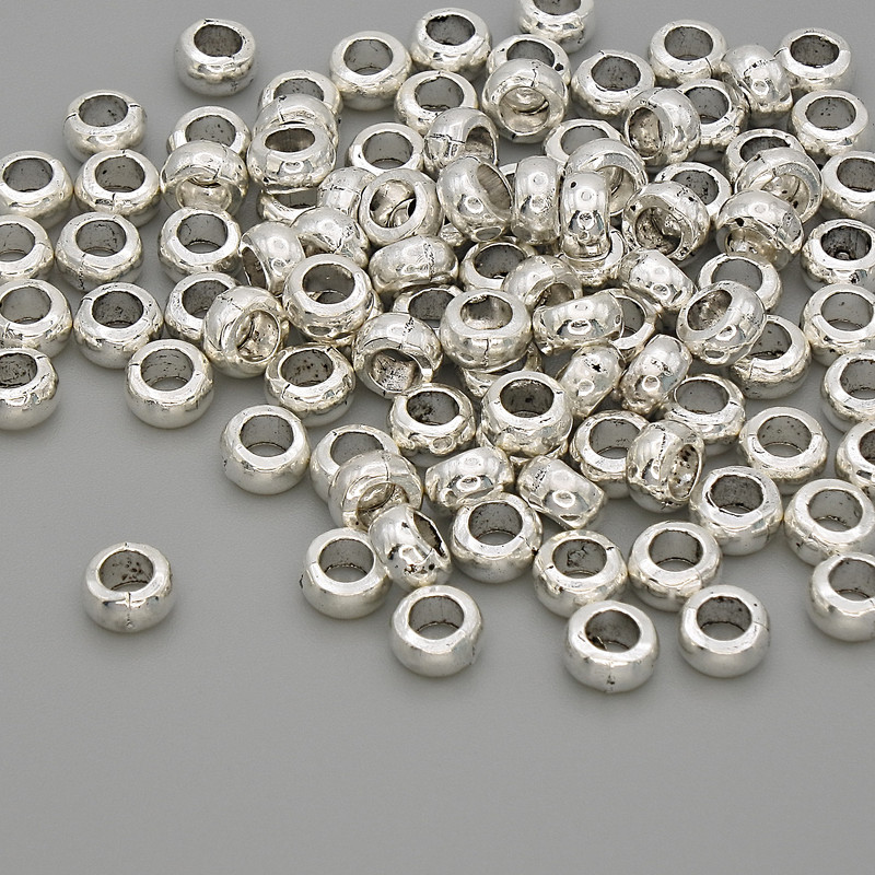 Koralik-wstawka, kolor metalu: srebro, średnica 5×2,5 mm, otwór średnicy około 2,8 mm, opakowanie 20 g (~101 szt.)