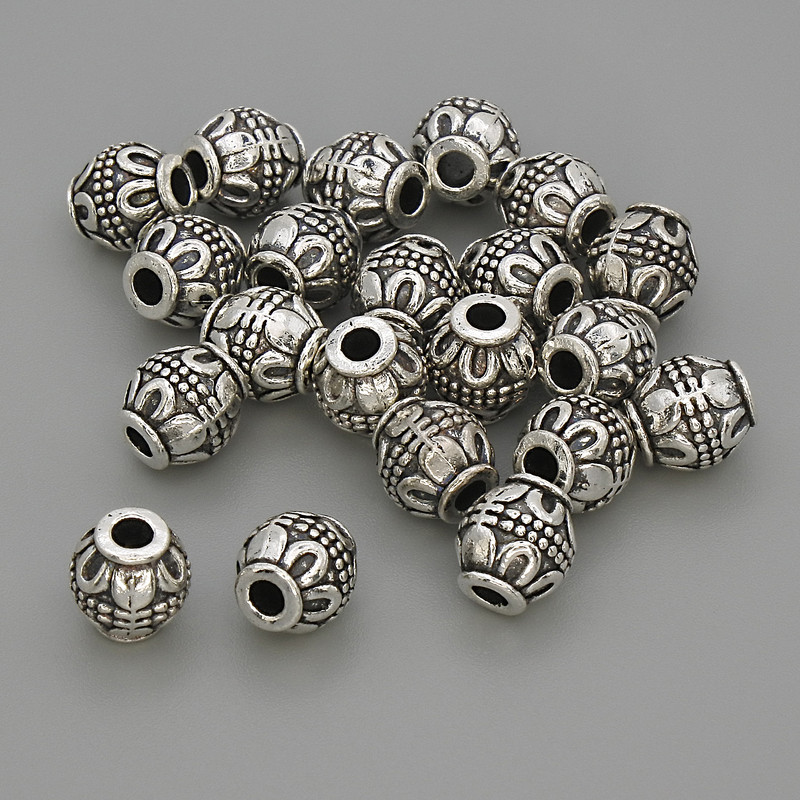 Koralik-wkładka, kolor metalu: srebrzysty, średnica 7×6,5 mm, otwór 2,5 mm, opakowanie 20 g (~21 szt.)