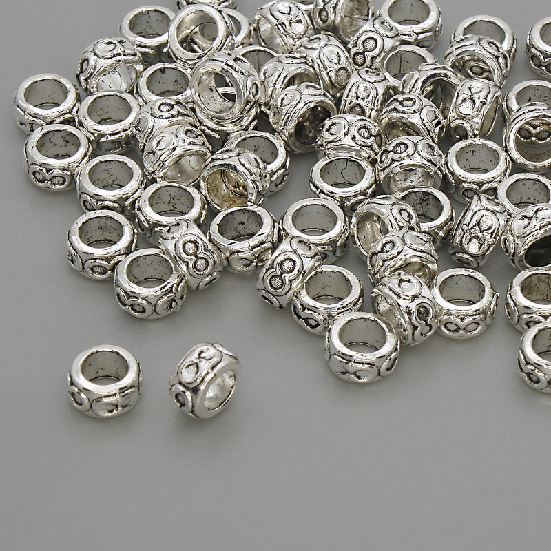 Koralik-wkładka do biżuterii, kolor metalu: srebrzysty, średnica 6×3,5 mm, otwór Ø ok. 6 mm, opakowanie 20 g (~60 szt.)