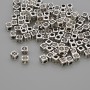 Furnitura jubilerska – koralik-wstawka o kolorze metalu srebrzystym, średnica 4×3×3 mm z otworem około 6 mm, opakowanie 20 g (~110 szt.)