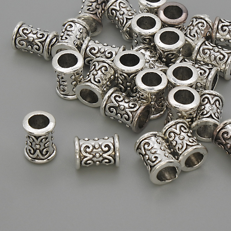 Koralik-wstawka do biżuterii, kolor metalu: srebrzysty, średnica 9×6 mm ±, otwór Ø 4,5 mm ±, opakowanie 20 g (~27 szt.)