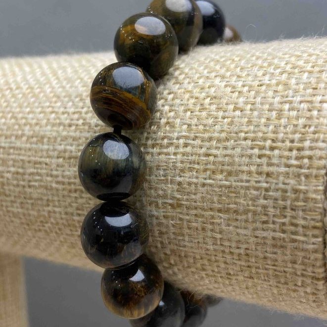 Bransoletka z naturalnego kamienia: tygrysie oko i sokolowe oko, gładka kuleczka, średnica około 12 mm, długość 18 cm (rozciągliwa)