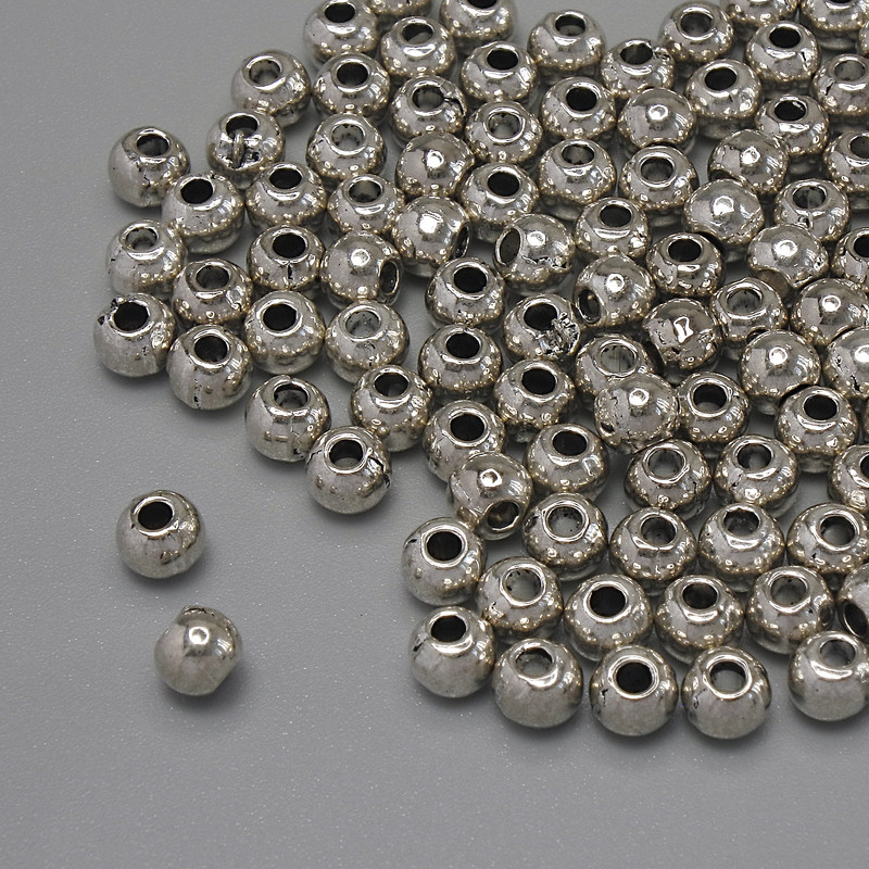 Koralik-wkładka w kolorze metalu: srebro, średnica 4×3,5 mm, otwór 1,6 mm, opakowanie 20 g (~108 szt.)