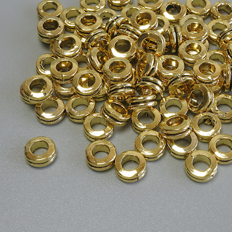 Koralik-wkładka w kolorze złota, średnica 6×2,5 mm ± otwór, średnica 3,2 mm ± opakowanie 20 g (~77 szt.)