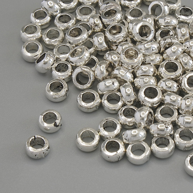 Koralik-wstawka, kolor metalu: srebrny, średnica 5×3 mm, otwór ~3 mm, opakowanie 20 g (~100 szt.)