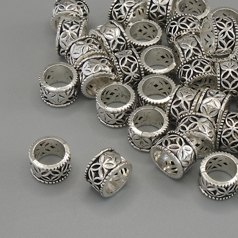 Koralik-wkładka w kolorze srebra, średnica 8x5 mm, otwór około 6 mm, opakowanie 20 g (ok. 36 szt.)