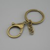 Cena za opakowanie /10 szt. Podstawa do breloka z dwoma zaczepami: karabinek 33×24 mm i pierścień, średnica 3 cm, długość 7 cm