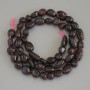Koraliki granatu fasetowanego, średnica 8-12×7-9 mm ± na nici, długość 40 cm+