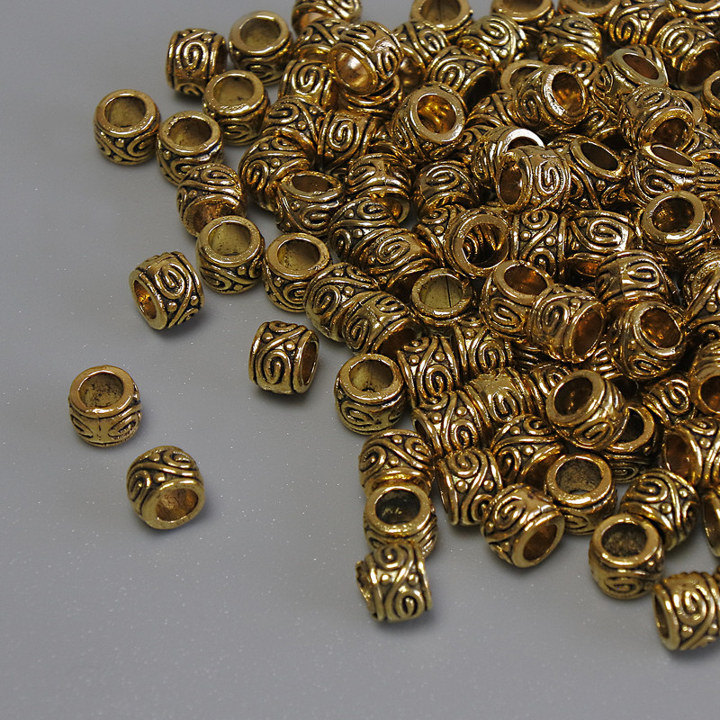 Koralik-wstawka w kolorze złotym, średnica 4×3 mm ± otwór, średnica 2,5 mm ± opakowanie 20 g (~155 szt.)