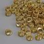 Koralik-wstawka w kolorze złota, średnica 6×2,5 mm, otwór około 3,5 mm, opakowanie 20 g (~74 szt.)