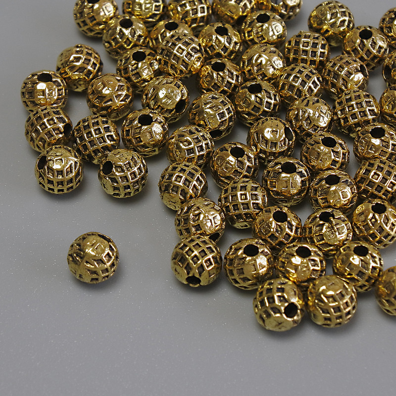 Koraliki-wstawki do biżuterii, kolor metalu: złoty, średnica 5 mm, otwór 1,5 mm, opakowanie 20 g (~60 szt.)