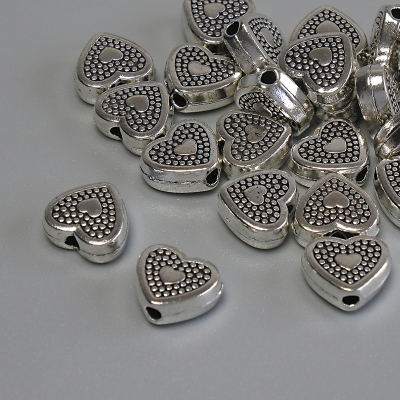 Koralik-wkładka „Serce” w srebrnym odcieniu, średnica 8,5×7,5 mm, otwór 2 mm, opakowanie 20 g (~21 szt.)