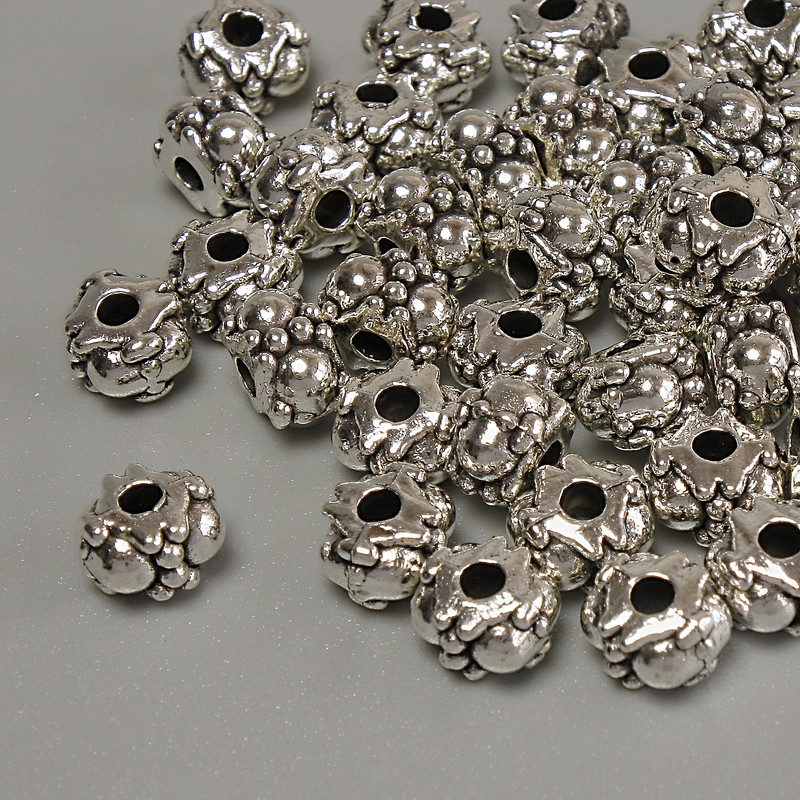 Koralik-wstawka o kolorze metalu srebrnym, średnica 5,5×4 mm, ± otwór 1,9 mm, opakowanie 20 g (~41 szt.)