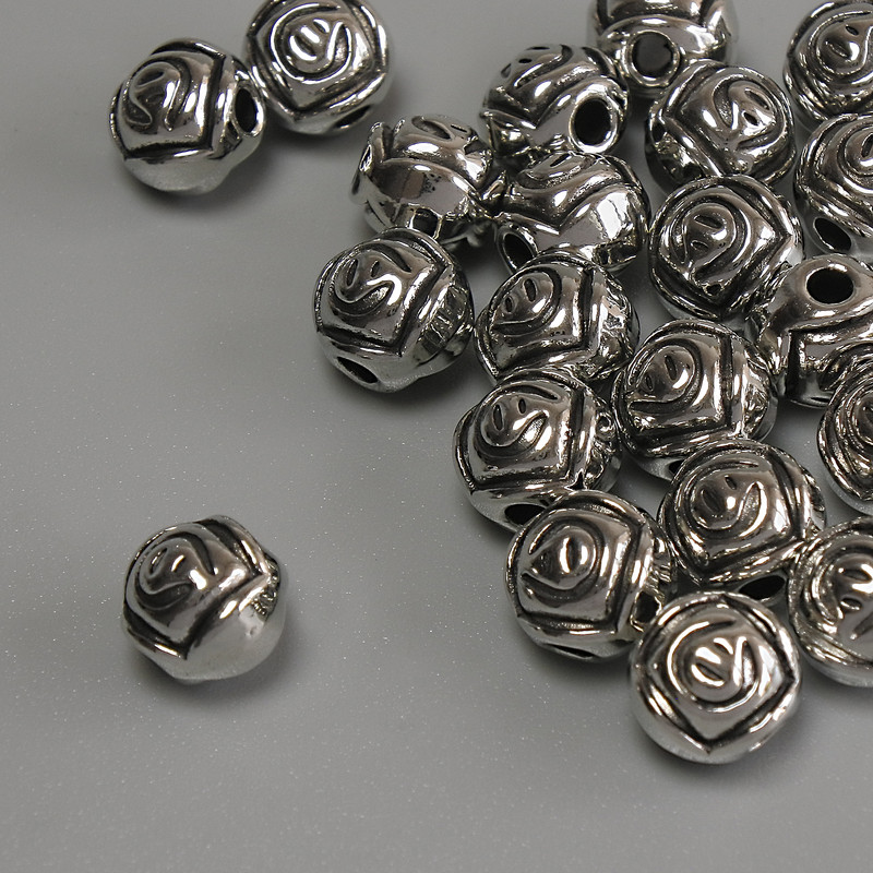 Koralik-wkładka 'Kwiat' kolor metalu srebro, średnica 7 mm ± otwór, średnica 2 mm ± opakowanie 20 g (~21 szt.)