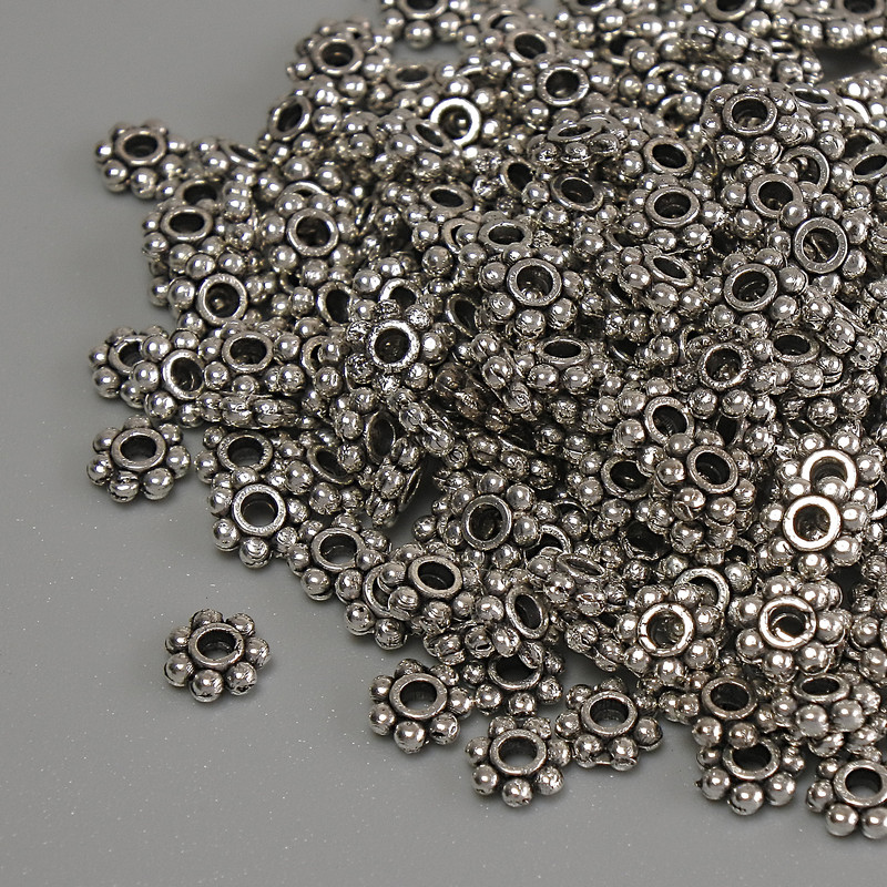 Koralik-wstawka w kolorze srebra, średnica 4×1,5 mm, otwór 1,5 mm, opakowanie 20 g (~279 szt.)