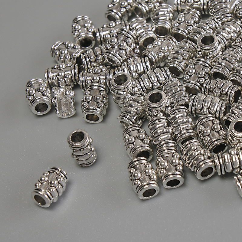 Koralik-wstawka, kolor metalu: srebrny, średnica 6×4 mm ± otwór, średnica 1,8 mm ± opakowanie 20 g (~62 szt.)