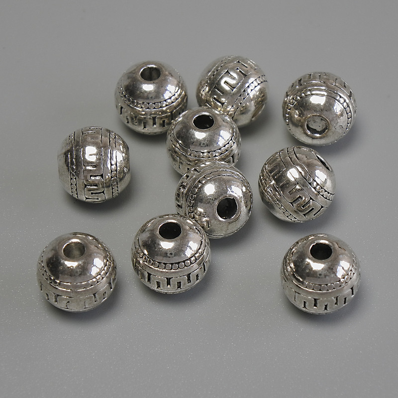 Furnitura jubilerska – koralik-wstawka, kolor metalu: srebro, średnica 8 mm ± otwór, średnica 2–3 mm ± opakowanie 20 g (~10 szt.)