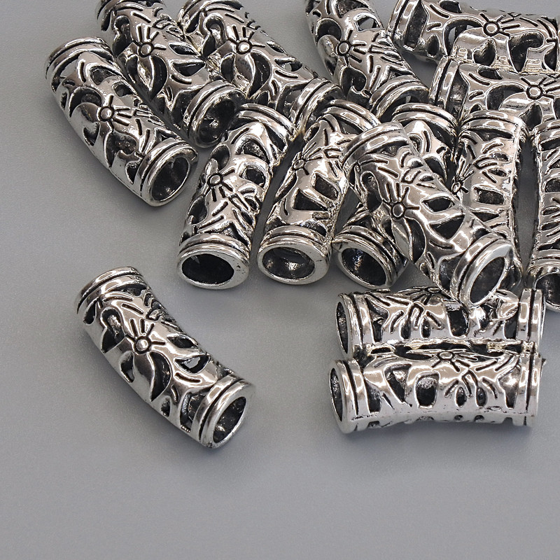 Wstawka koralika w kolorze metalu – srebro, średnica 19,5×7 mm, otwór około 4,8 mm, opakowanie 15 szt.