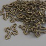 Wisiorek Krzyż, kolor metalu: brązowy, średnica 21×15 mm, opakowanie 23 szt.