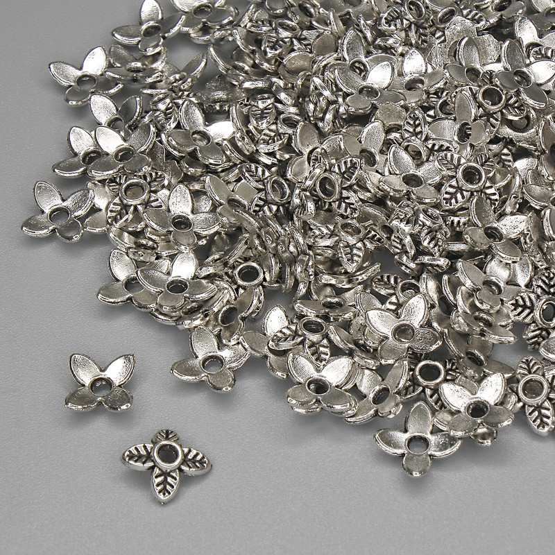 Czapeczka do koralików, kolor metalu: srebrny, średnica czapeczki 7×1 mm ± otwór ~1,5 mm, opakowanie 20 g (~159 szt.)