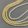 Koraliki żółte z czeskiego kryształu na nitce, fasetowana kulka, średnica 8 mm ±, długość 38 cm ±