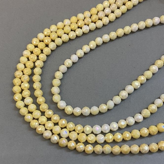 Koraliki żółte z czeskiego kryształu na nitce, fasetowana kulka, średnica 8 mm ±, długość 38 cm ±