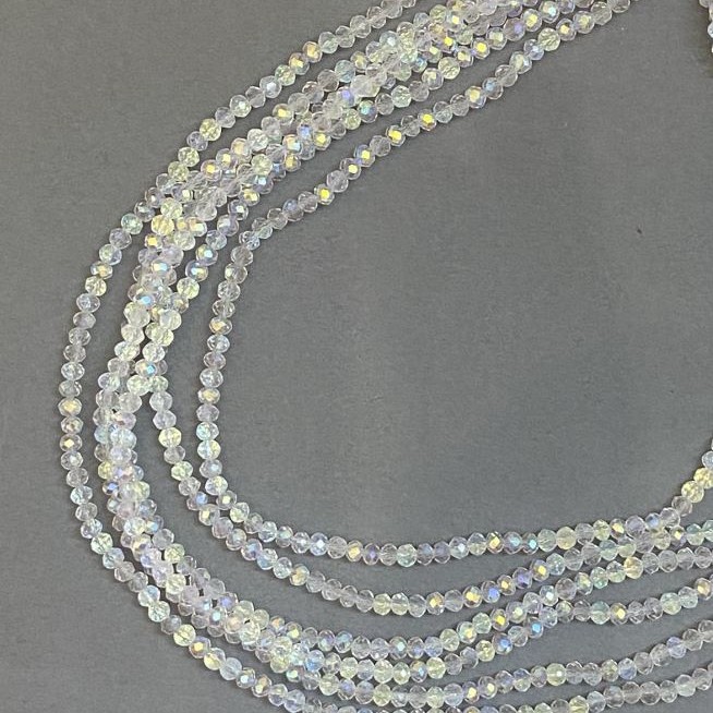 Koraliki czeskiego kryształu na żyłce, biały, przezroczysty, z benzynowym napylaniem, fasetowany rondel, średnica 3,5×3 mm, długość 33 cm