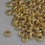 Furnitura jubilerska – koralik-wstawka w kolorze metalu złoto, średnica 6×2,5 mm, otwór Ø ok. 3,5 mm, opakowanie 20 g (~93 szt.)