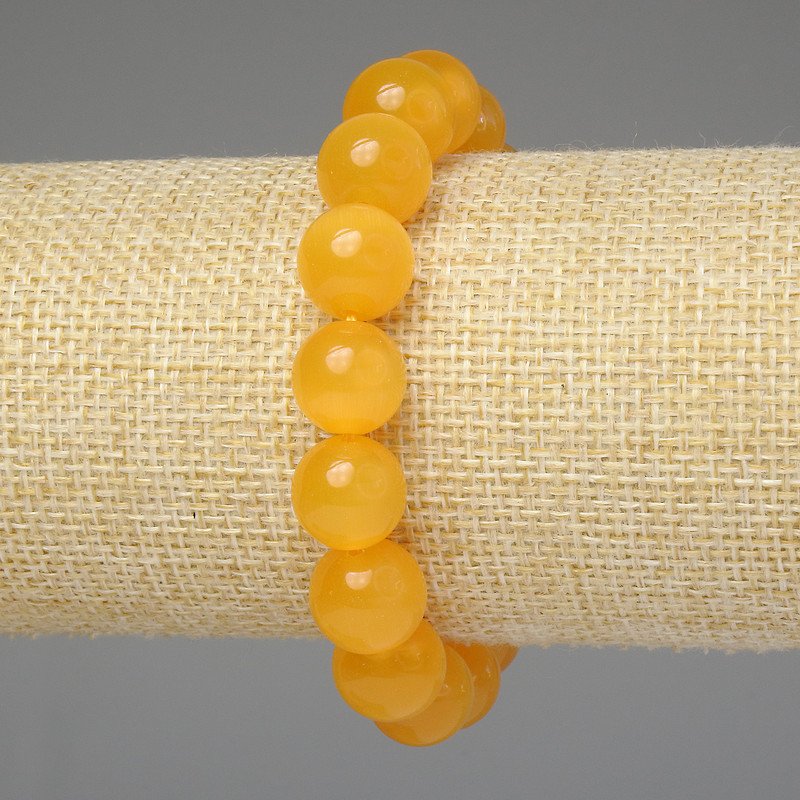 Bransoletka z żółtym kocim okiem, gładkie kulki 12 mm, długość 18 cm, elastyczna