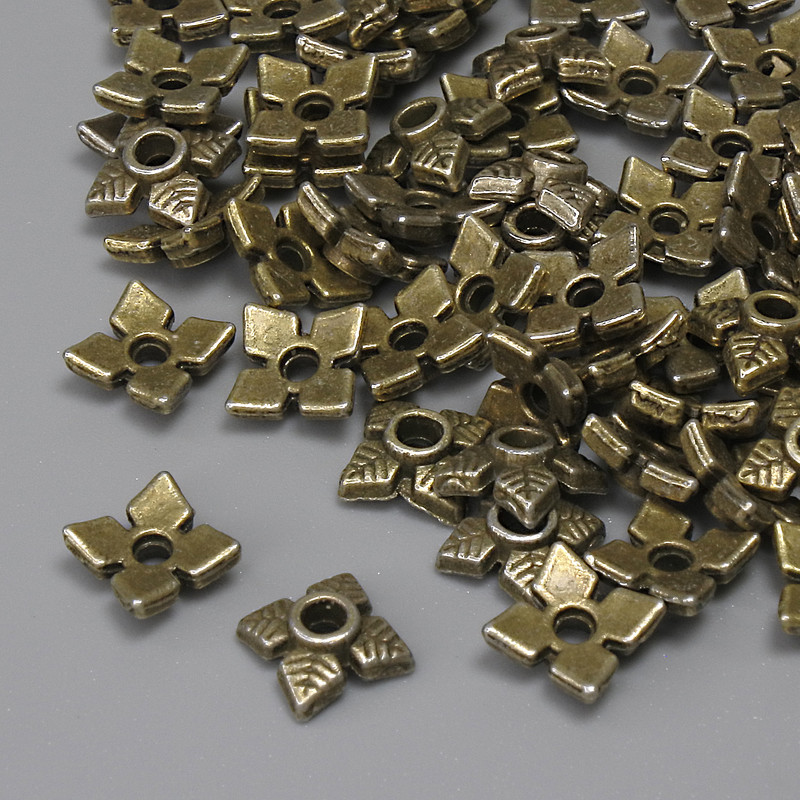 Czapeczka do koralików w kolorze metalu brązowym, średnica 6×6×1,5 mm z otworem około 1,5 mm, opakowanie 44 szt.
