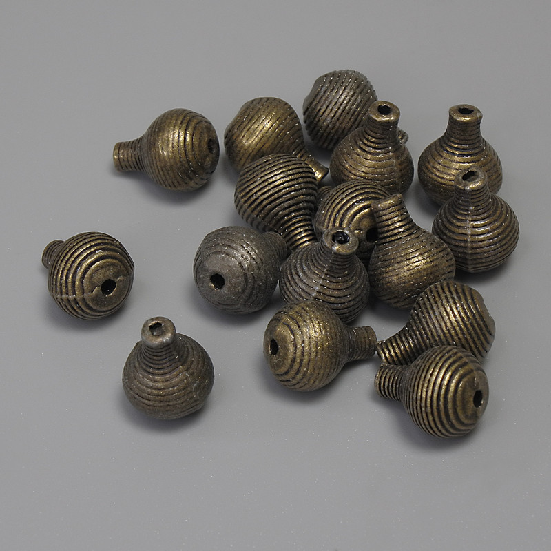Koralik-wkładka w kolorze metalu brązowym, średnica 10x73 mm, otwór 1 mm, opakowanie 15 szt.