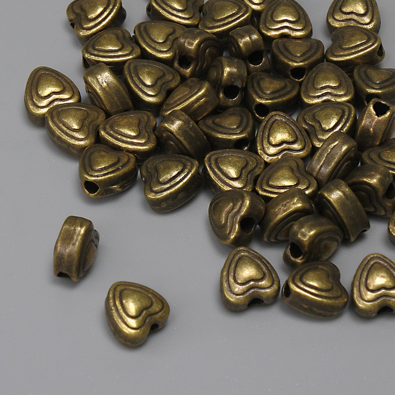 Okucia – koralik-wkładka w kolorze metalu brąz, średnica 5,5×5,5 mm, otwór 1,78 mm, opakowanie 44 szt. +