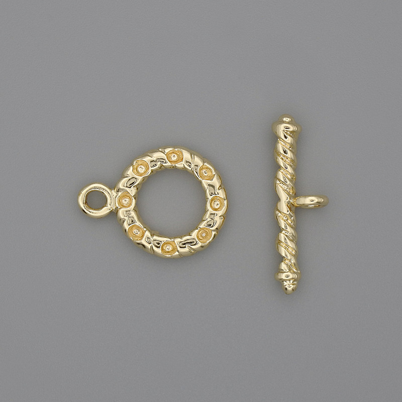Zapięcie toggle, złoty kolor metalu, wymiary 21×3 mm, koło o średnicy około 13 mm, średnica otworu 8 mm ±