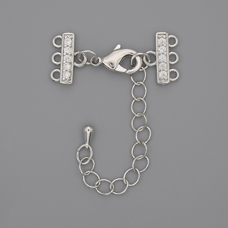 Zapięcie do bransoletek i koralików na trzy nici ze kryształkami i przedłużającym łańcuszkiem, metal srebrzysty, średnica 7×12 mm, długość 3 cm