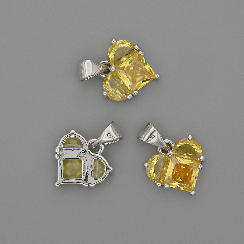 Wisiorek w kształcie serca z żółtymi kryształami 12×12 mm ±, długość 17 mm ±, metal srebrzysty