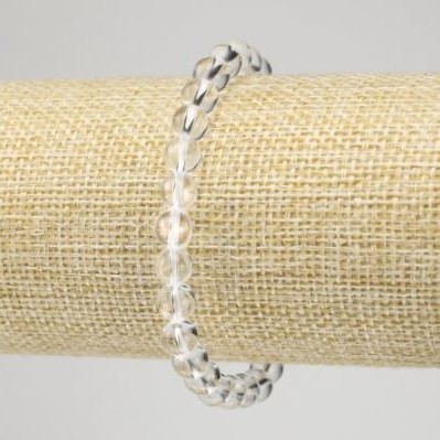 Bransoletka z górskiego kryształu — gładka kulka, średnica 6,5 mm, długość 18 cm, elastyczna