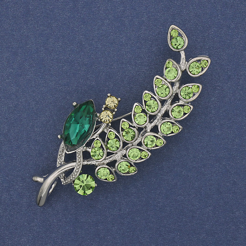 Broszka Gałązka z kolorowymi strassami, metal o odcieniu srebra, 66×26 mm +