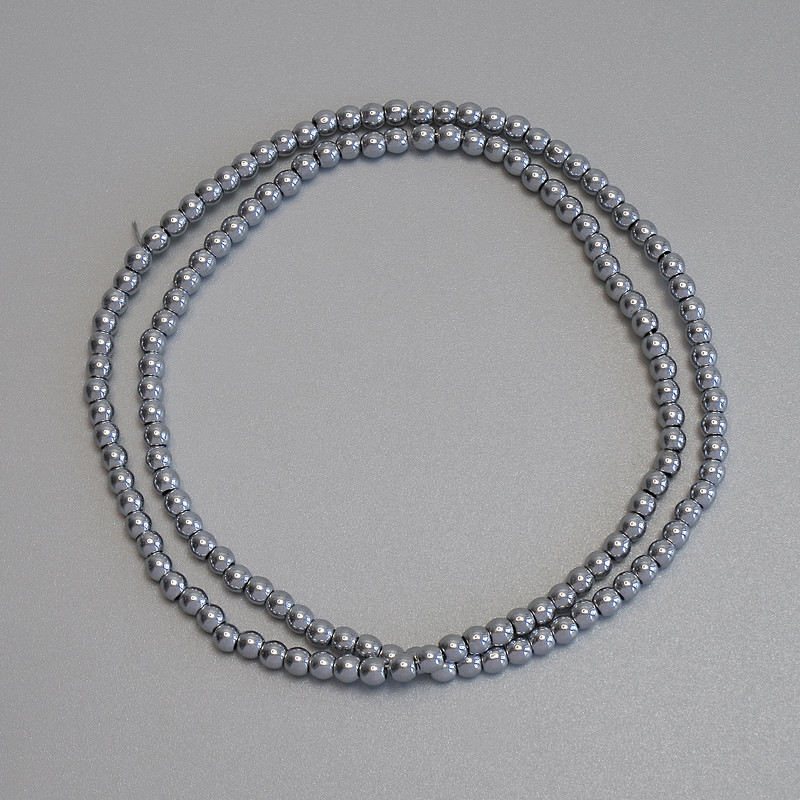Koraliki hematitu w kolorze srebra, gładkie kuleczki 3 mm ± na żyłce, długość 39 cm+