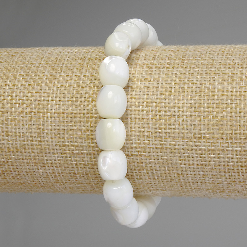 Bransoletka z masy perłowej w kształcie baryłek, średnica 10×9,5 mm, długość 18 cm, elastyczna