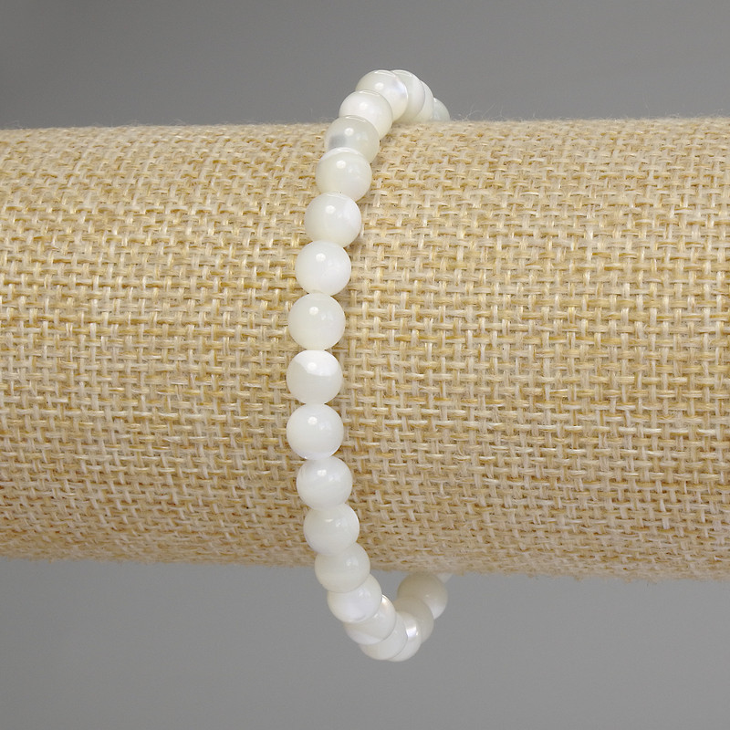 Bransoletka z masy perłowej, gładka kulka, średnica 6 mm, długość 18 cm, elastyczna