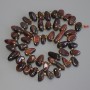 Koraliki z kamienia tygrysie oko – drobny motylek, średnica 10-15×6-8 mm ±, koraliki 3 mm ±, długość 39 cm ± na nitce