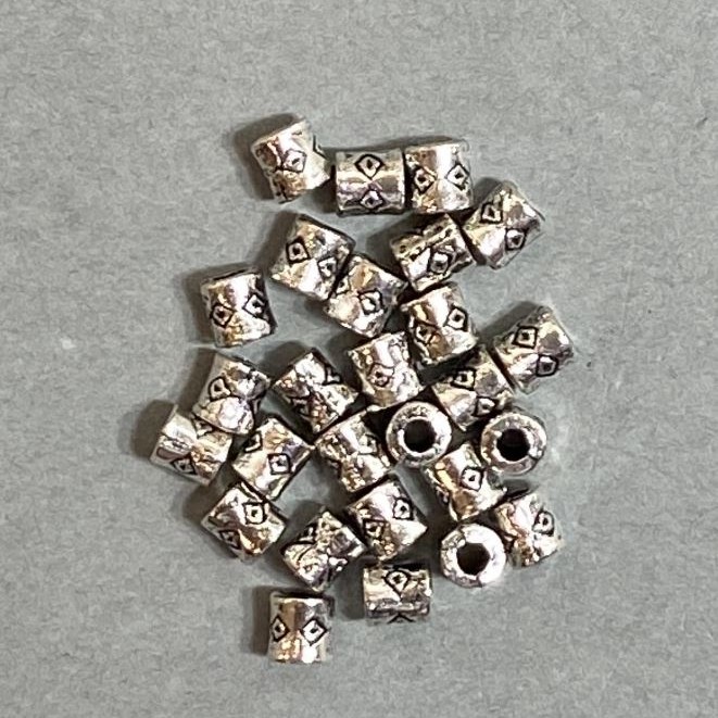 Wstawka koralikowa, kolor metalu: srebrny, średnica 4×3 mm, otwór 2 mm, opakowanie 20 g (~110 szt.)