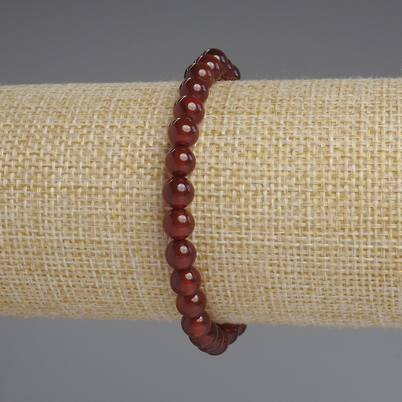 Bransoletka z karneolu – gładkie kuleczki o średnicy około 6 mm, długość 18 cm, elastyczna
