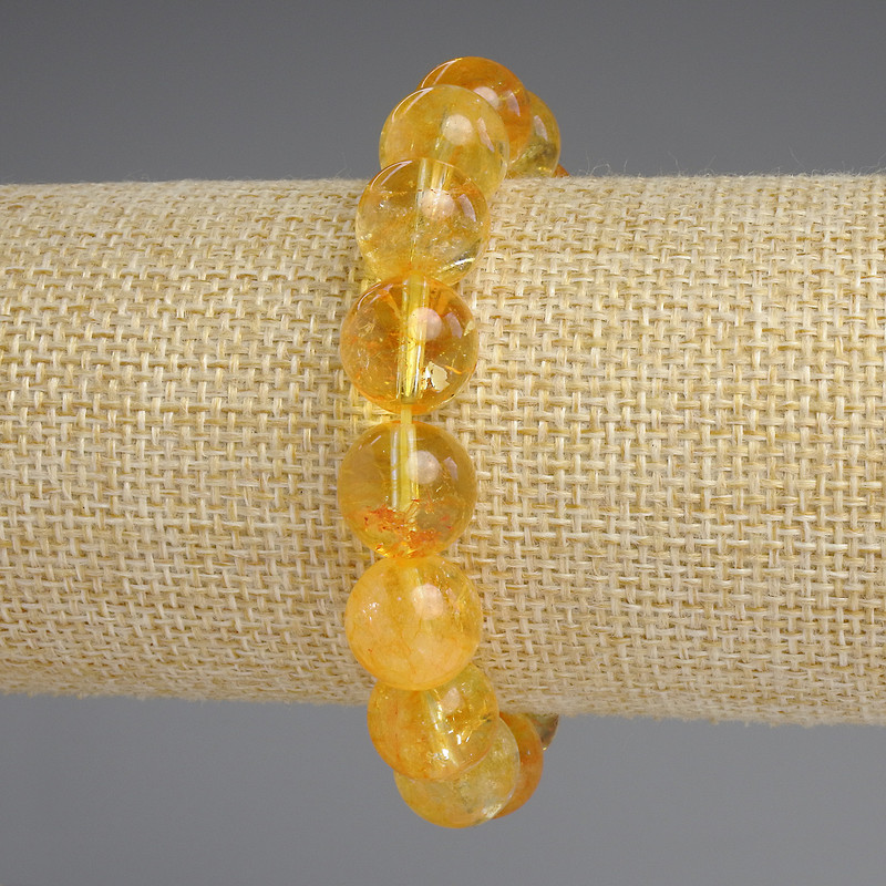 Bransoletka z cytryną w formie gładkich kulek, o średnicy 12 mm, długość 18 cm, elastyczna