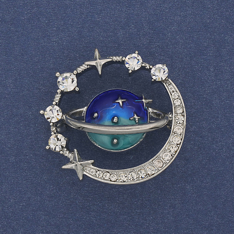 Broszka Planeta emalia, białe kryształy, srebrzysty metal, 30 mm+