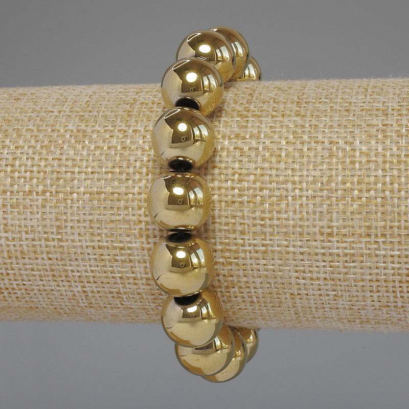 Bransoleta z hematitu koloru złotego, gładkie kule, o średnicy 12 mm, długość 18 cm, elastyczna