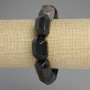 Bransoletka z naturalnego obsydianu, srebrzyste wielokąty, średnica 20×15–16 mm, długość 18 cm ±